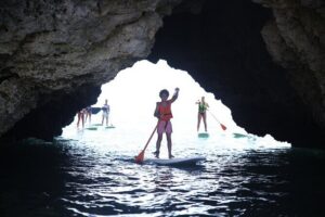 Cliffs & Caves Stand Up Paddle Adventure - The beginner lesson: balancing, paddling, and confidence