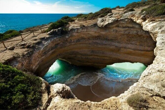 From Albufeira: Benagil Tour, Bones & Medieval Silves Castle - Stop 1: Praia de Nossa Senhora da Rocha (Chapel + Cliff Views)