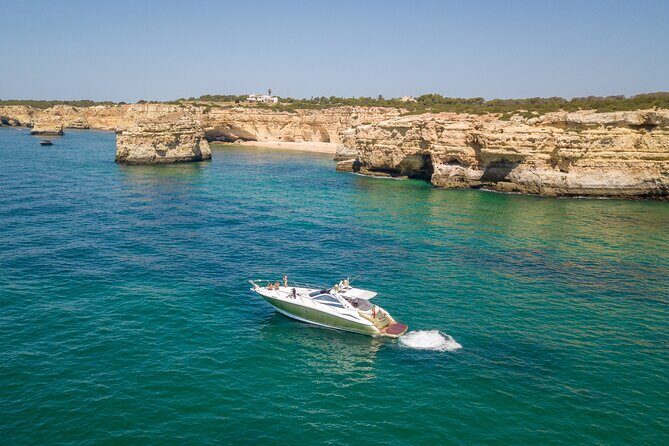 Full-Day Private Cruise in the Algarve Coast by Luxury Yacht - Michelin-ranked beaches and the Alfanzina lighthouse: cruising as the main attraction